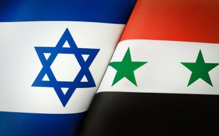 Israel and Syria normalize relations by...?